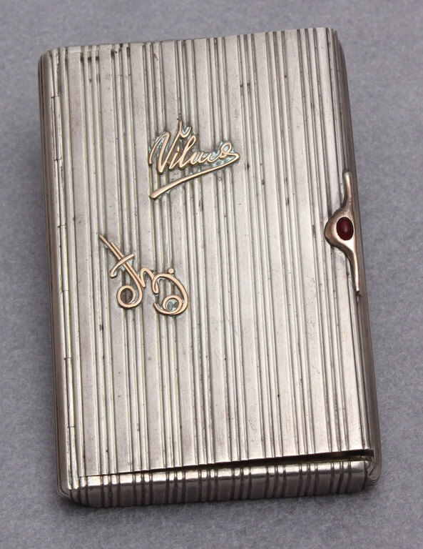 Silver cigarette holder with gold inlays