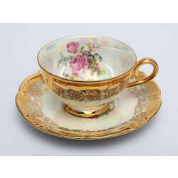 Porcelain coffee cup with saucer