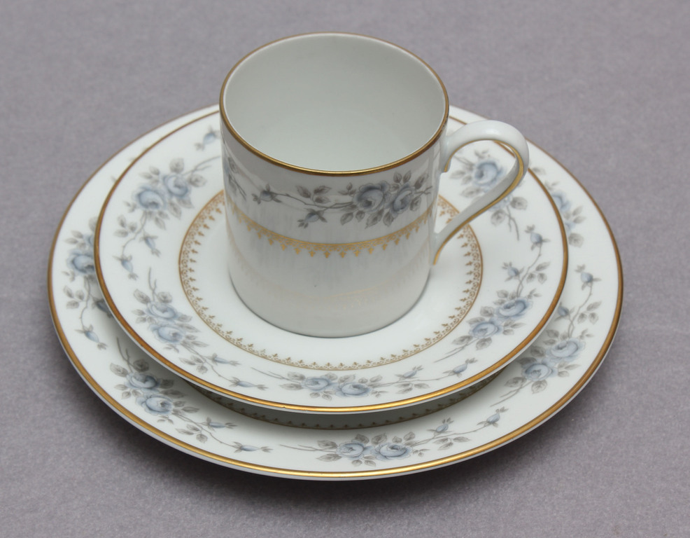 Porcelain cup with saucer and plate