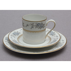 Porcelain cup with saucer and plate