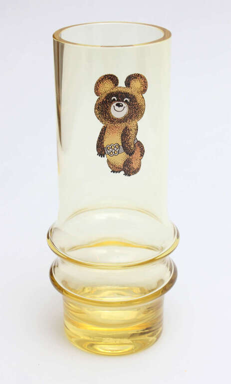 Yellow glass vase with the Olympic bear