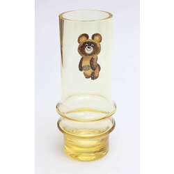 Yellow glass vase with the Olympic bear