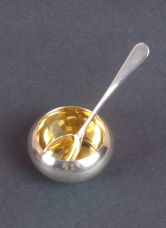 Silver spice jar with a spoon