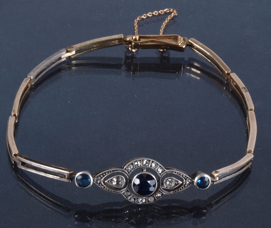 Golden bracelet with diamonds and sapphires