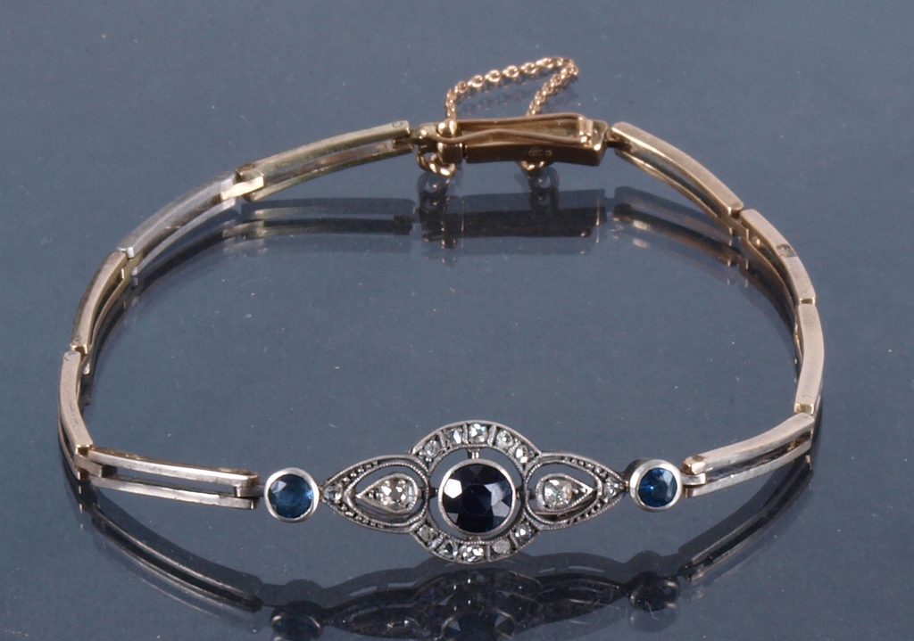 Golden bracelet with diamonds and sapphires